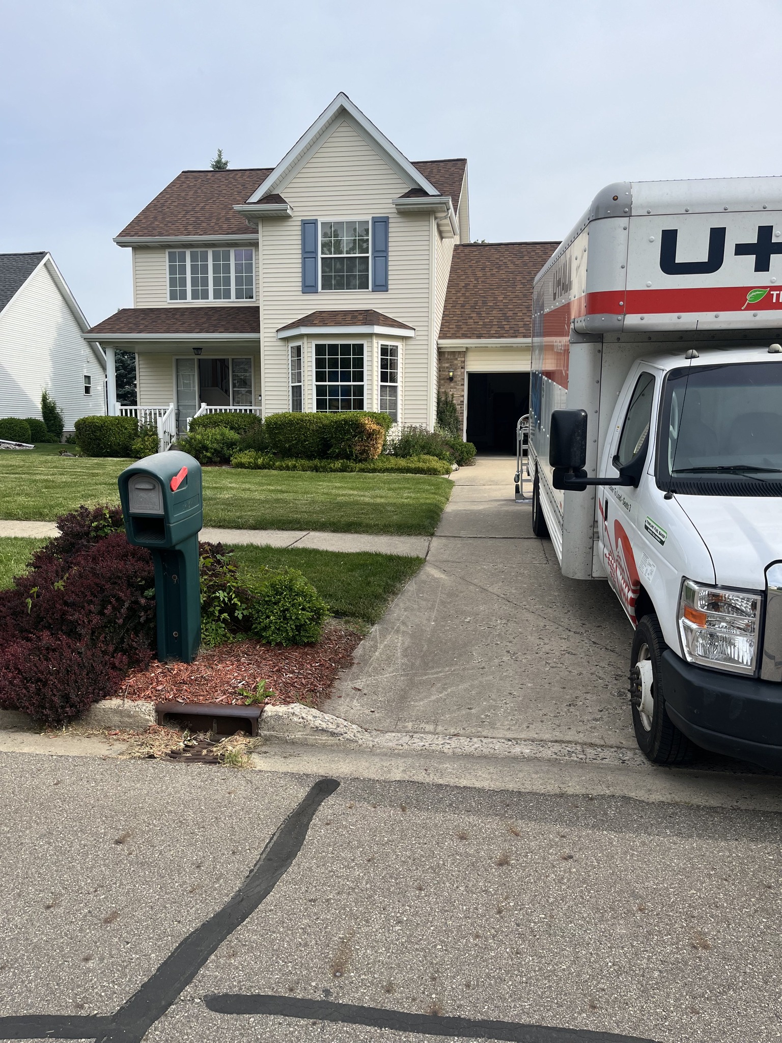 Moving truck outside a home